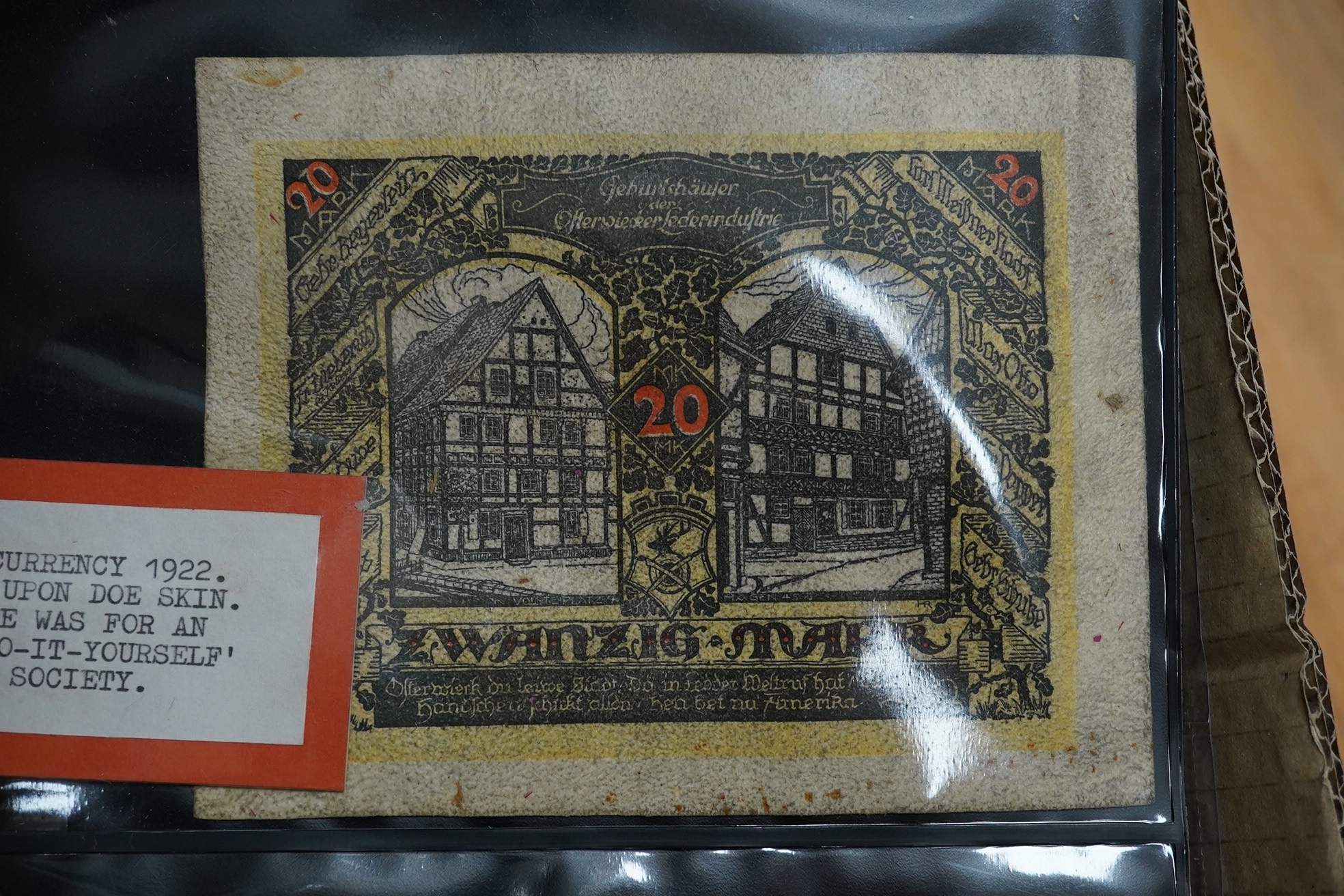 A collection of assorted world issue paper money including 1922 German doeskin, 1937 USSR Lenin, Malta P.11 1939, Zimbabwe, French Revolution British Government Forgery, 1878 Bank of Madras and Japanese.